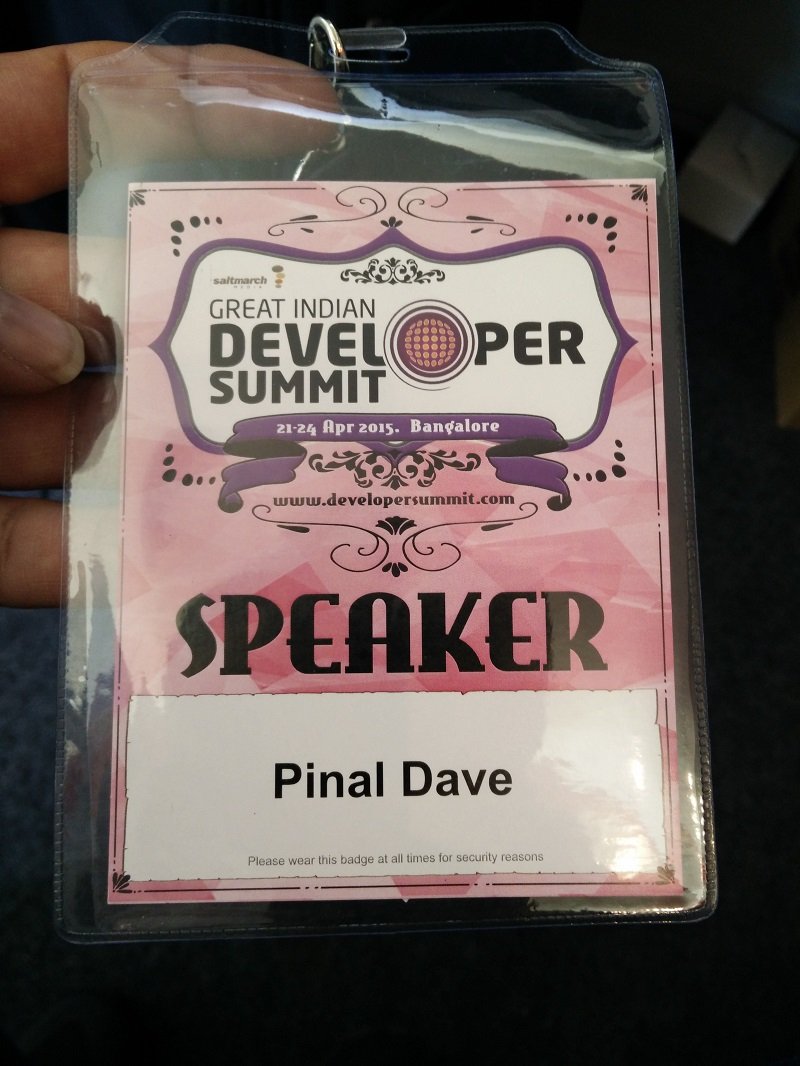 A speaker badge at a tech conference.